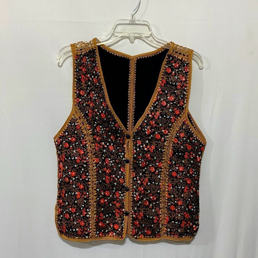 VINTAGE 70s patchwork of painted leather pieces crochet together to create vest
